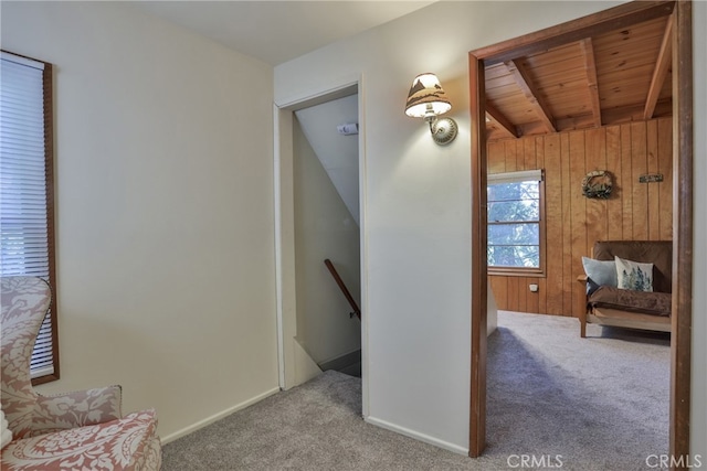 23800 Scenic Dr, Crestline, CA 92325 - sitting room with an upstairs landing, carpet, wood walls, and wooden ceiling