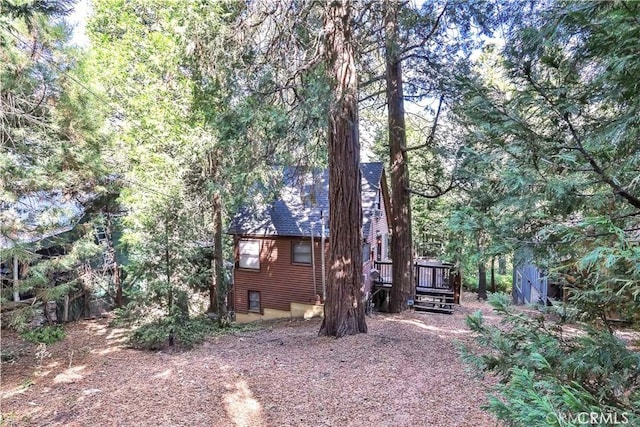 23800 Scenic Dr, Crestline, CA 92325 - view of side of property featuring a wooden deck