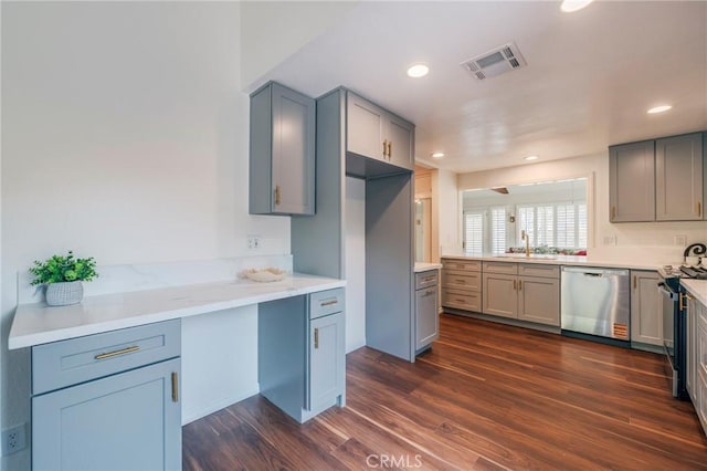4397 N Skylark Ct, Moorpark, CA 93021 - kitchen with visible vents, dark wood-style flooring, recessed lighting, a sink, and appliances with stainless steel finishes