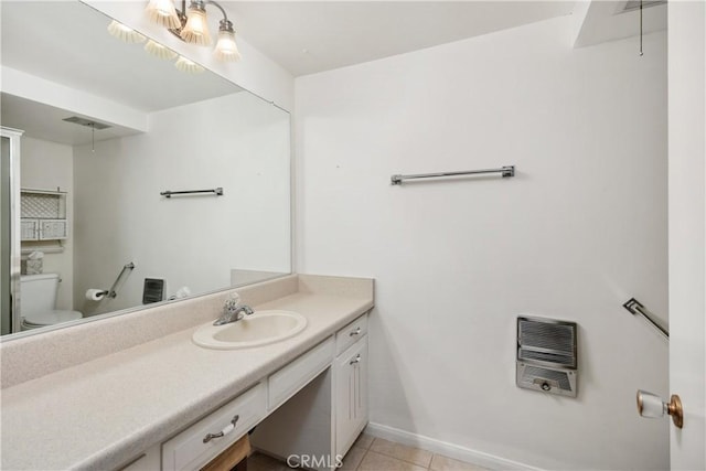 124 Via Estrada Unit D, Laguna Woods, CA 92637 - bathroom with baseboards, heating unit, toilet, tile patterned floors, and vanity