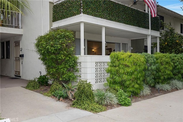 124 Via Estrada Unit D, Laguna Woods, CA 92637 - view of home's exterior featuring stucco siding