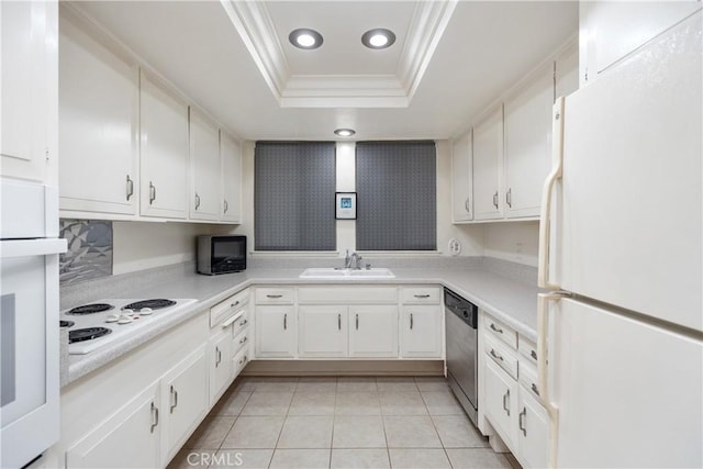 124 Via Estrada Unit D, Laguna Woods, CA 92637 - kitchen with crown molding, a sink, a tray ceiling, recessed lighting, and white appliances