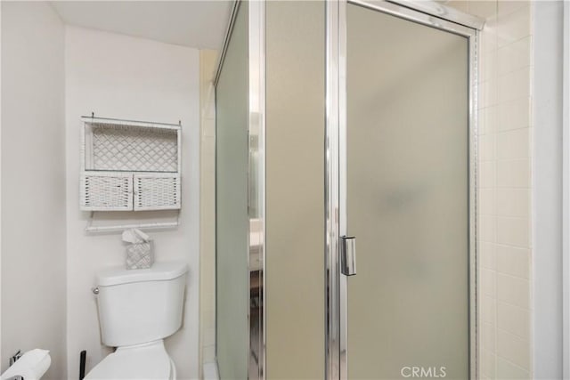 124 Via Estrada Unit D, Laguna Woods, CA 92637 - bathroom with a shower stall and toilet