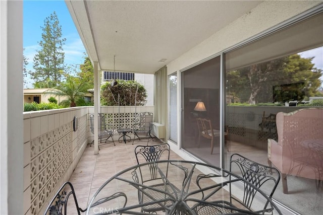 124 Via Estrada Unit D, Laguna Woods, CA 92637 - balcony featuring outdoor dining area
