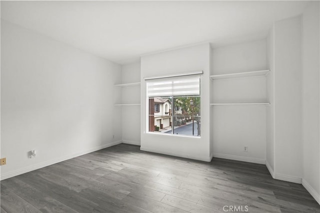 2960 Champion Way Unit 2706, Tustin, CA 92782 - empty room with baseboards and wood finished floors