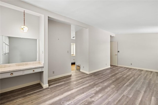 851 Crest Vista Dr, Monterey Park, CA 91754 - unfurnished living room featuring baseboards and wood finished floors
