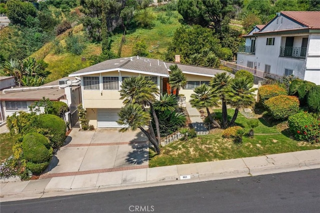 851 Crest Vista Dr, Monterey Park, CA 91754 - view of front of home with driveway, a garage, and stucco siding