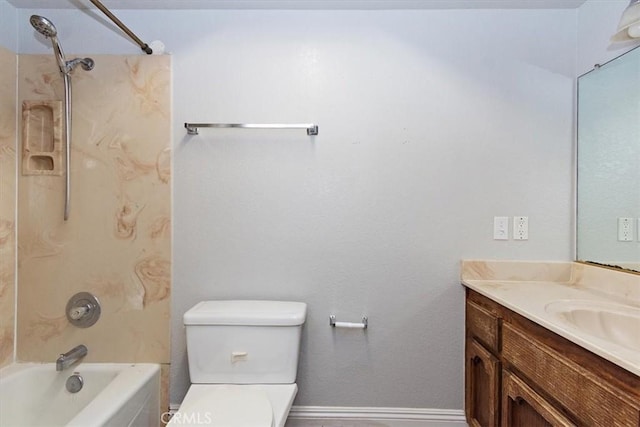 bathroom with toilet, shower / bathing tub combination, vanity, and baseboards