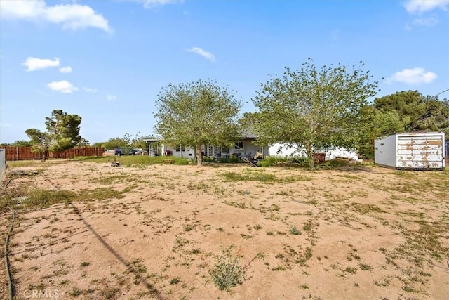 view of yard with fence