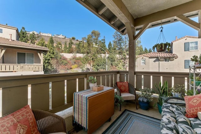 balcony with an outdoor hangout area