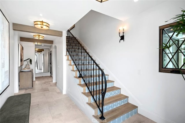 staircase with baseboards and recessed lighting