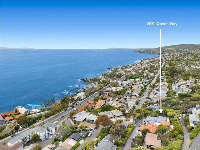 bird's eye view featuring a residential view and a water view