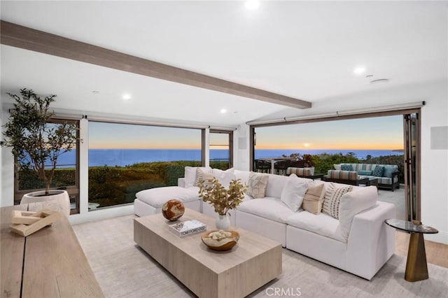 living room with beam ceiling, recessed lighting, and light wood finished floors
