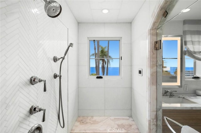 full bathroom featuring walk in shower, vanity, recessed lighting, and marble finish floor