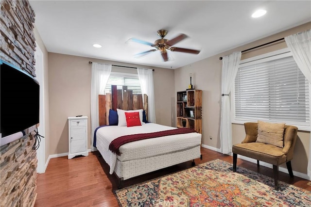 825 Grass Valley Rd, Lake Arrowhead, CA 92352 - bedroom featuring ceiling fan, wood finished floors, and baseboards