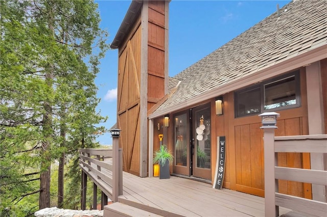 825 Grass Valley Rd, Lake Arrowhead, CA 92352 - exterior space with a wooden deck and roof with shingles