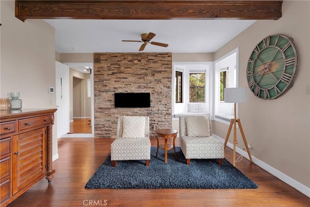 825 Grass Valley Rd, Lake Arrowhead, CA 92352 - living area with beamed ceiling, ceiling fan, wood finished floors, and baseboards