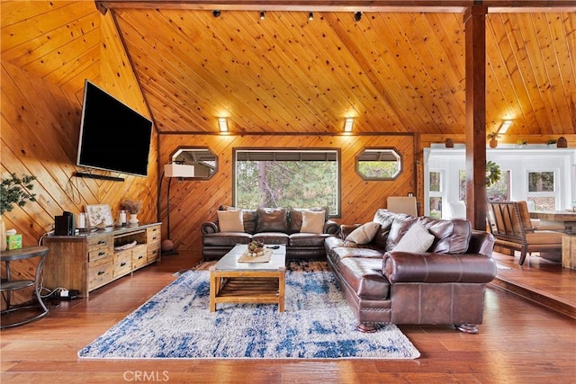 825 Grass Valley Rd, Lake Arrowhead, CA 92352 - living room with wood walls, hardwood / wood-style flooring, and lofted ceiling