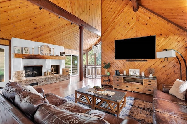 825 Grass Valley Rd, Lake Arrowhead, CA 92352 - living room featuring beam ceiling, wood finished floors, wooden walls, and high vaulted ceiling