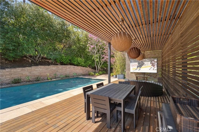 1935 Maverick Ln, North Tustin, CA 92705 - wooden deck with outdoor dining space and a fenced in pool