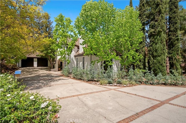 1935 Maverick Ln, North Tustin, CA 92705 - view of property exterior featuring aphalt driveway and stucco siding