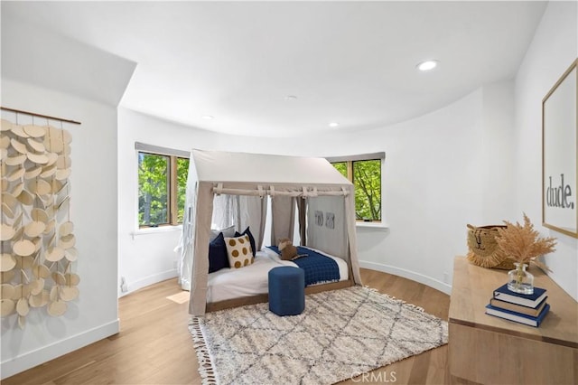1935 Maverick Ln, North Tustin, CA 92705 - bedroom with recessed lighting, multiple windows, wood finished floors, and baseboards
