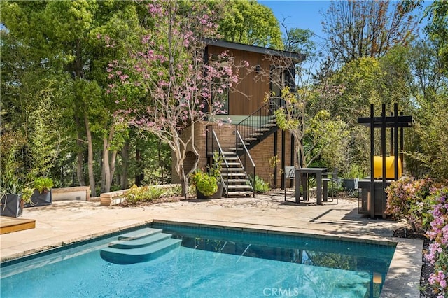 1935 Maverick Ln, North Tustin, CA 92705 - outdoor pool featuring stairway and a patio