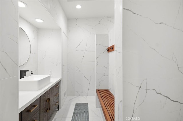 1935 Maverick Ln, North Tustin, CA 92705 - full bath featuring tile walls, recessed lighting, marble finish floor, and vanity