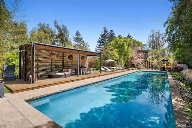1935 Maverick Ln, North Tustin, CA 92705 - outdoor pool with a wooden deck and stairs
