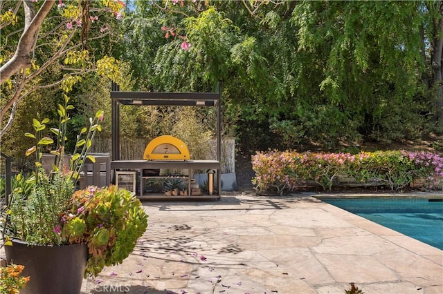 1935 Maverick Ln, North Tustin, CA 92705 - view of patio / terrace featuring an outdoor pool