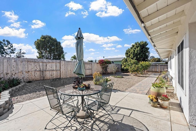 3185 Monroe St, Carlsbad, CA 92008 - fenced backyard featuring a patio and outdoor dining space
