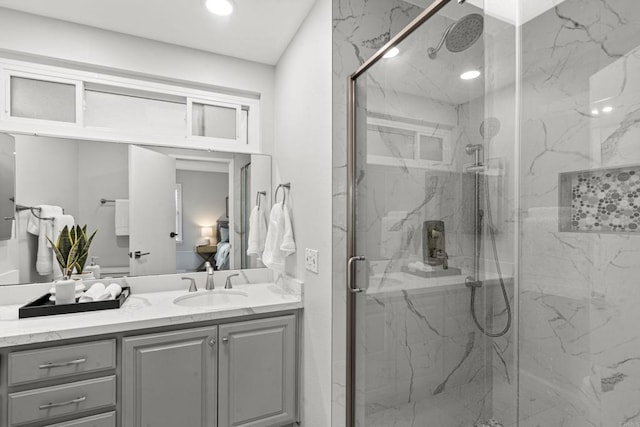 3185 Monroe St, Carlsbad, CA 92008 - ensuite bathroom featuring vanity, a marble finish shower, and recessed lighting