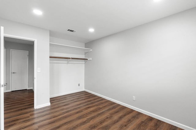 3185 Monroe St, Carlsbad, CA 92008 - unfurnished bedroom featuring baseboards, dark wood-style floors, recessed lighting, and a closet