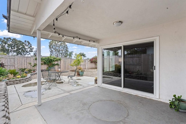 3185 Monroe St, Carlsbad, CA 92008 - fenced backyard with a patio and outdoor dining space