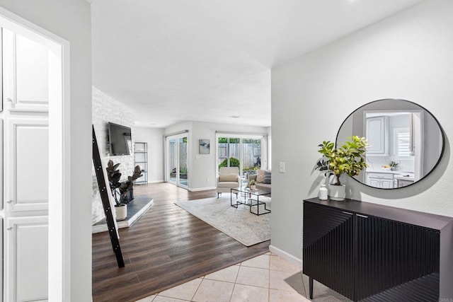 3185 Monroe St, Carlsbad, CA 92008 - hall featuring baseboards and light tile patterned floors