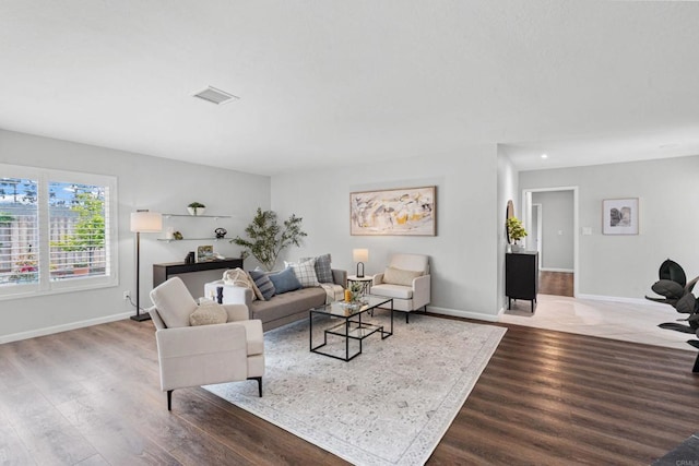 3185 Monroe St, Carlsbad, CA 92008 - living area with wood finished floors, baseboards, and recessed lighting