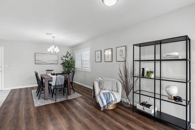 3185 Monroe St, Carlsbad, CA 92008 - dining room featuring wood finished floors, a chandelier, and baseboards