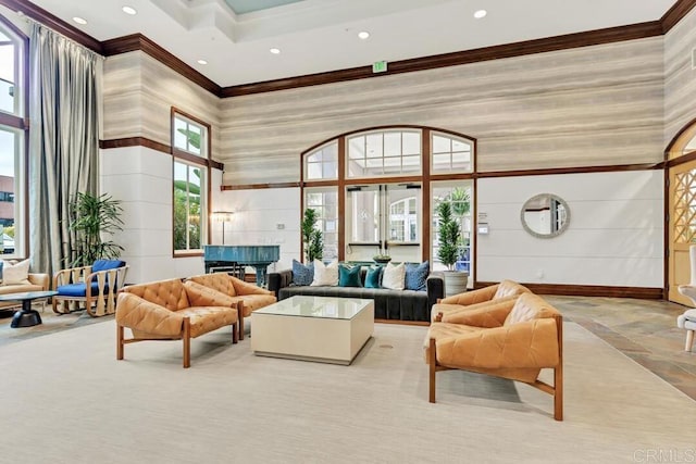 9253 Regents Unit A203, La Jolla, CA 92037 - living room with crown molding, a towering ceiling, recessed lighting, and baseboards
