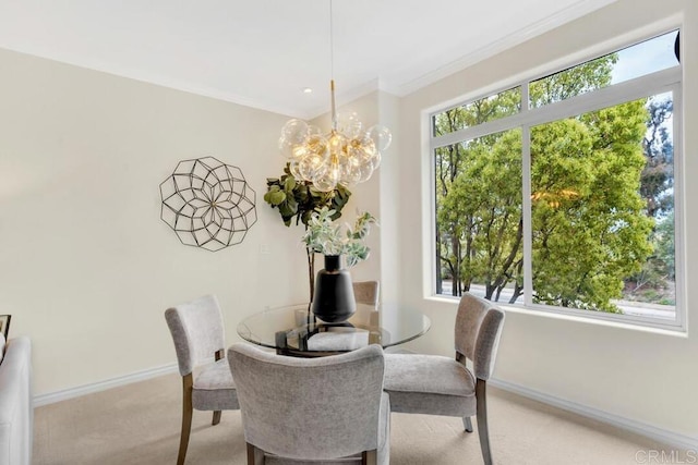 9253 Regents Unit A203, La Jolla, CA 92037 - carpeted dining room with a chandelier, baseboards, and ornamental molding