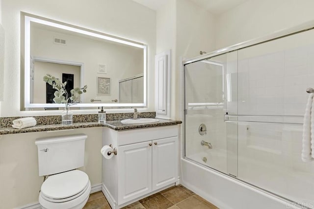 9253 Regents Unit A203, La Jolla, CA 92037 - bathroom featuring enclosed tub / shower combo, vanity, and toilet