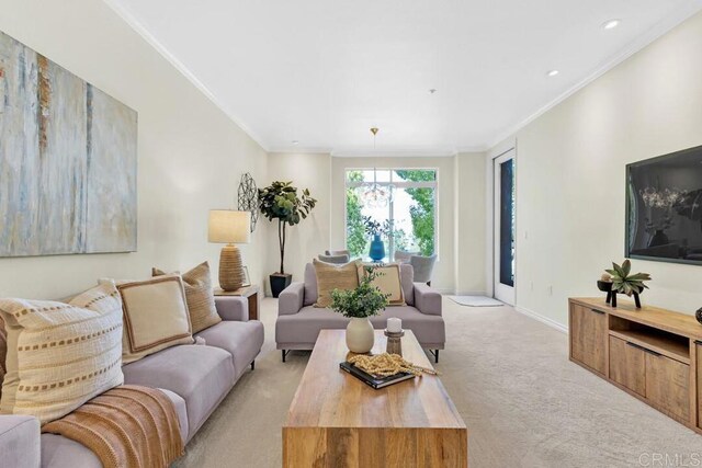 9253 Regents Unit A203, La Jolla, CA 92037 - living area with ornamental molding, light colored carpet, and baseboards