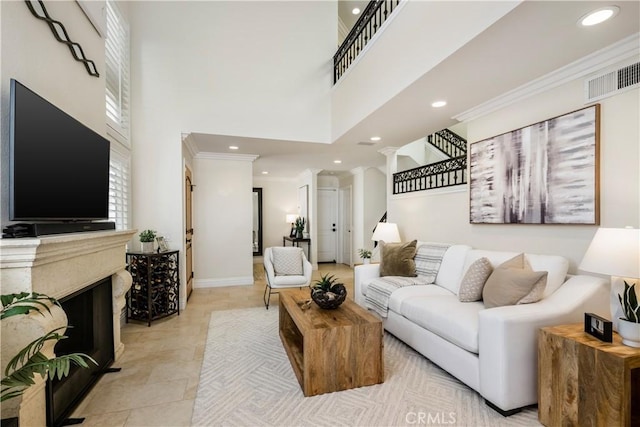 3 Terracima, Irvine, CA 92620 - living area with crown molding, a high ceiling, recessed lighting, and visible vents