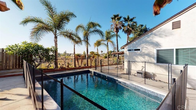 view of pool featuring fence and a fenced in pool