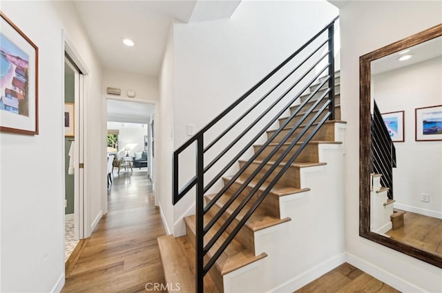 67 Corona Ave, Long Beach, CA 90803 - staircase featuring baseboards, recessed lighting, and wood finished floors