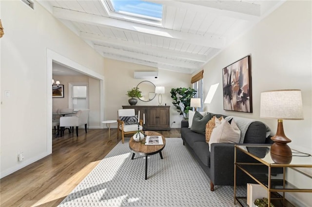 67 Corona Ave, Long Beach, CA 90803 - living area with baseboards, wooden ceiling, an AC wall unit, lofted ceiling with skylight, and wood finished floors