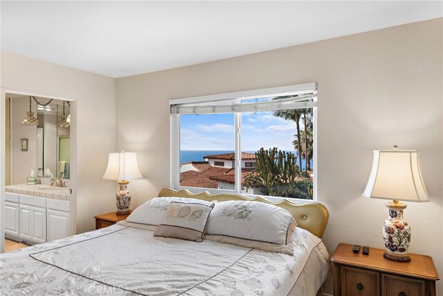 411 Avenida Granada Unit 4F, San Clemente, CA 92672 - bedroom with a sink and ensuite bath