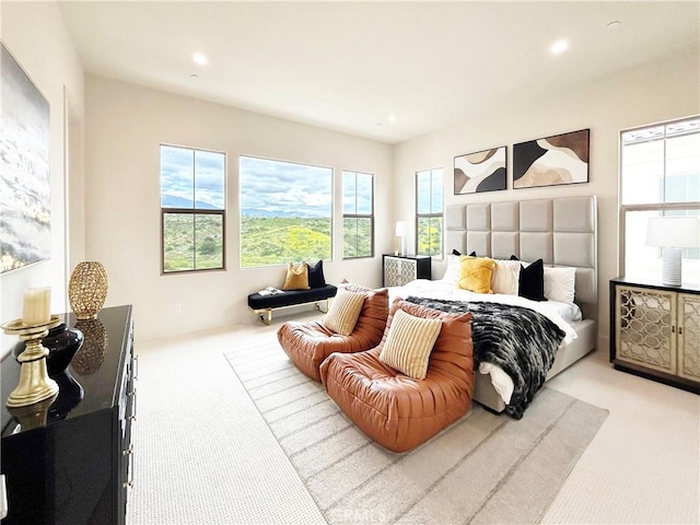 128 Mossvine, Irvine, CA 92618 - bedroom with multiple windows, light carpet, and recessed lighting