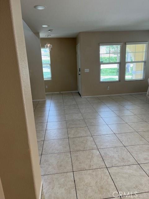 11433 Mountain View Dr Unit 62, Rancho Cucamonga, CA 91730 - spare room featuring light tile patterned floors, a chandelier, and recessed lighting
