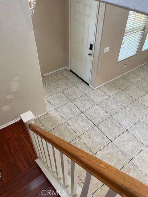 11433 Mountain View Dr Unit 62, Rancho Cucamonga, CA 91730 - foyer featuring baseboards and light tile patterned flooring