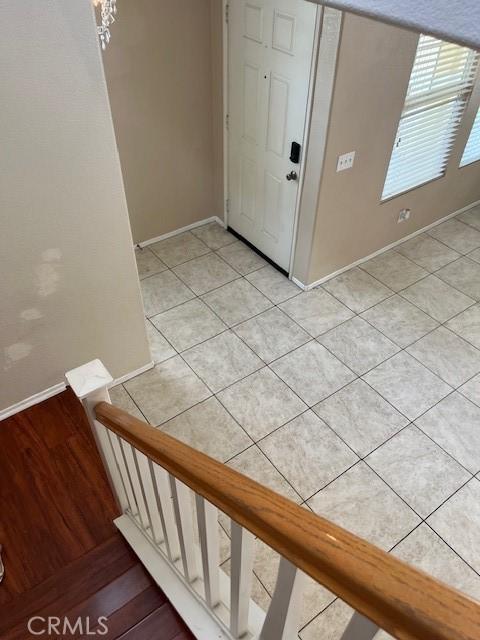 11433 Mountain View Dr Unit 62, Rancho Cucamonga, CA 91730 - foyer entrance with baseboards and light tile patterned floors